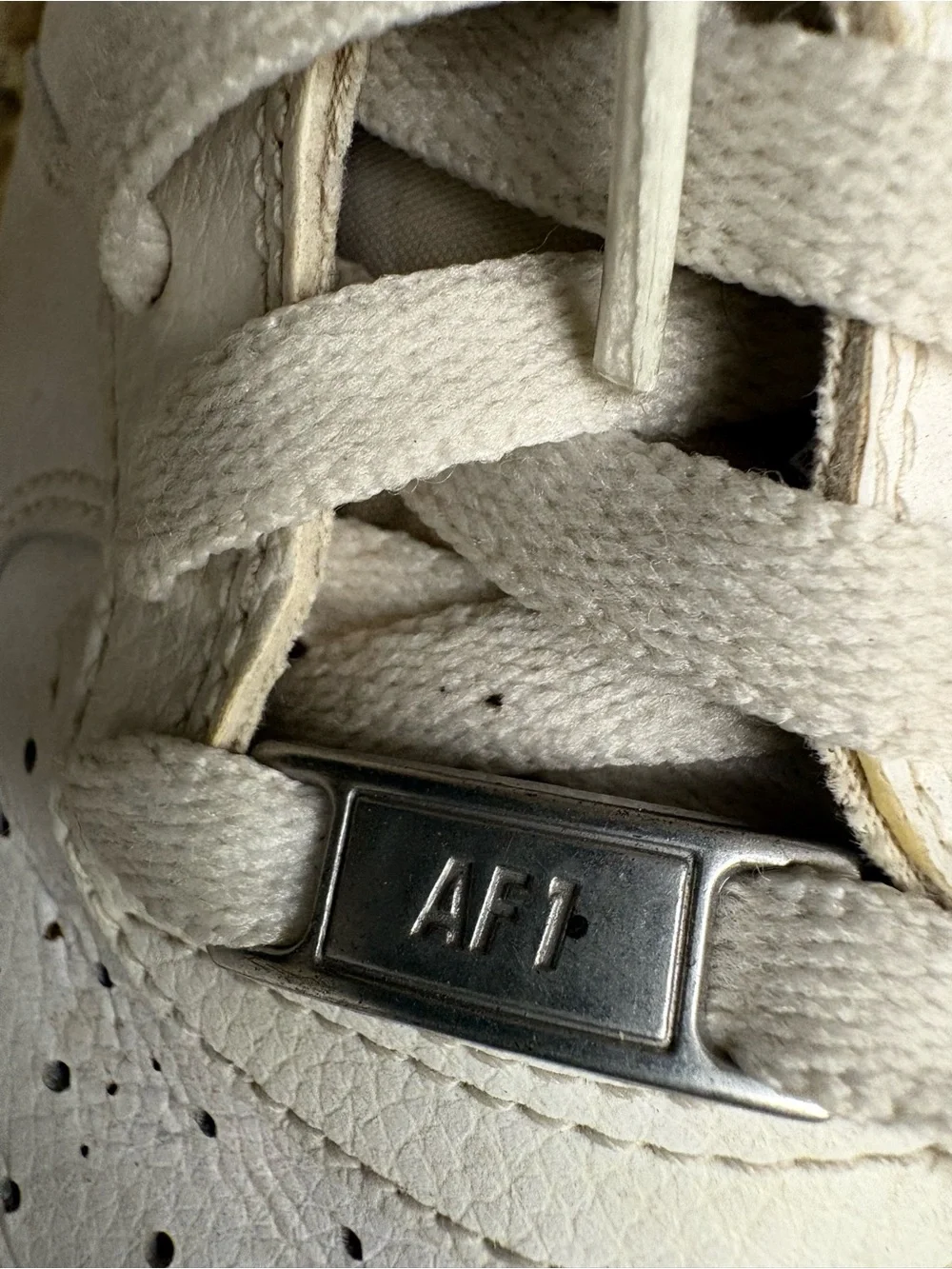 Nike White High-Top Sneakers with Cream Sole